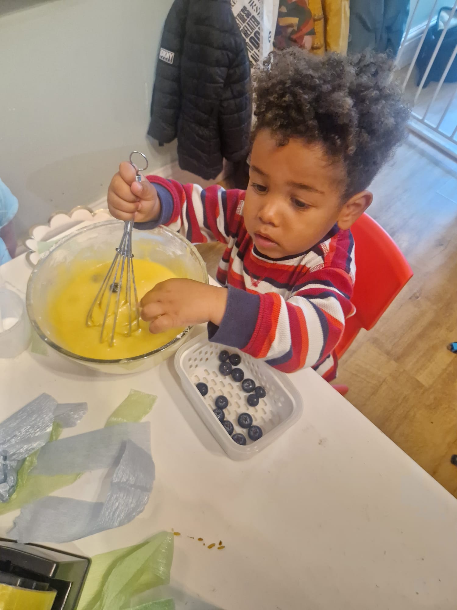 Children exploring hands-on creative activities.